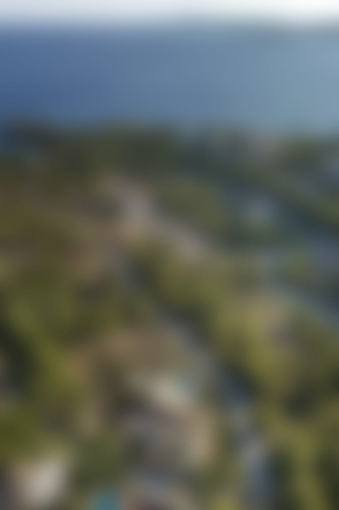 Villa Marlina seen from on high, with the sea just a few minutes' walk away.